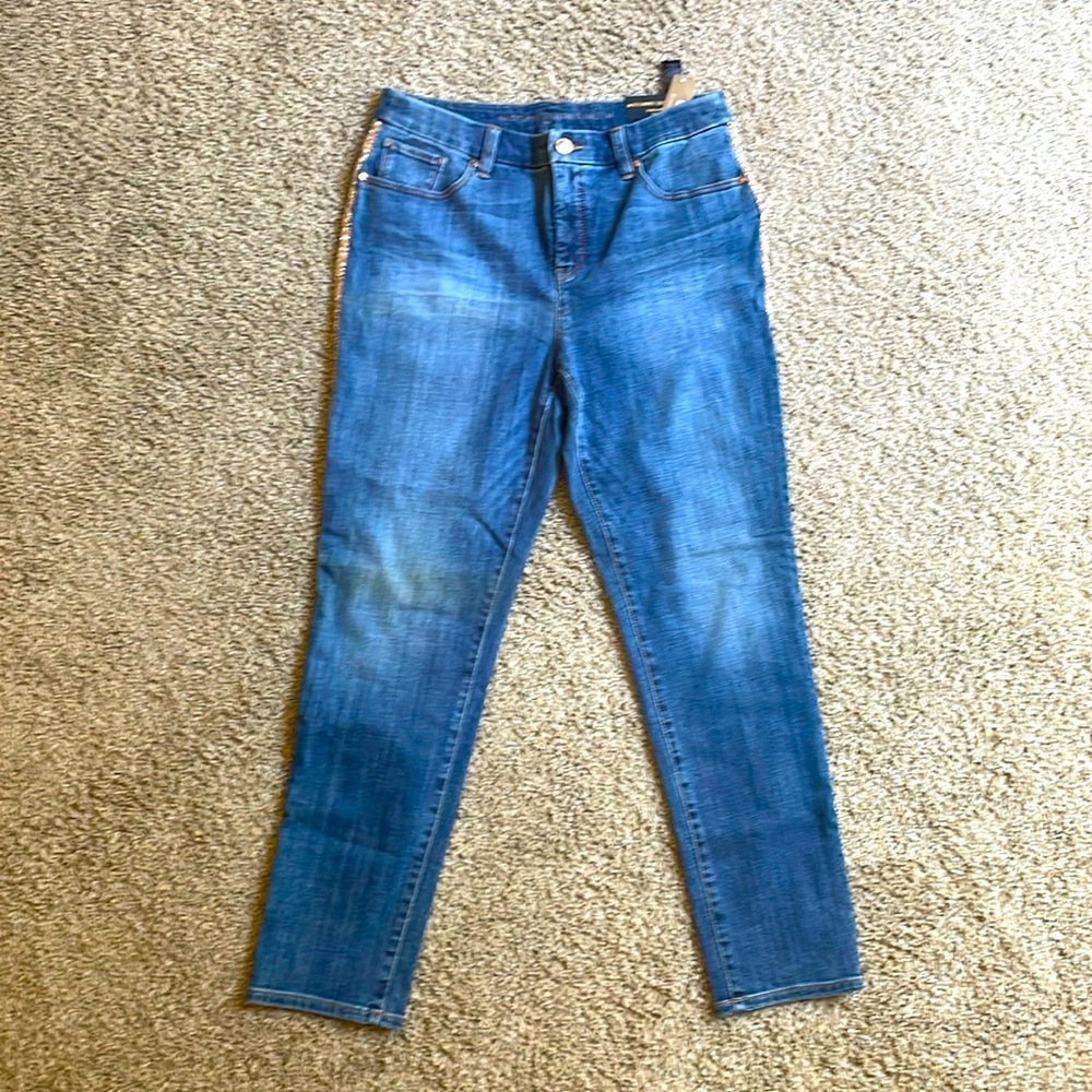 Chico’s So Slimming Girlfriend Ankle Jeans w/ gold glitter trim down sides.